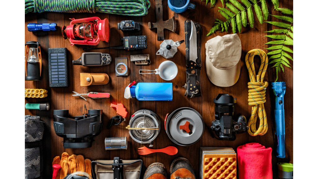 Tabletop view of go bag contents and emergency survival kit